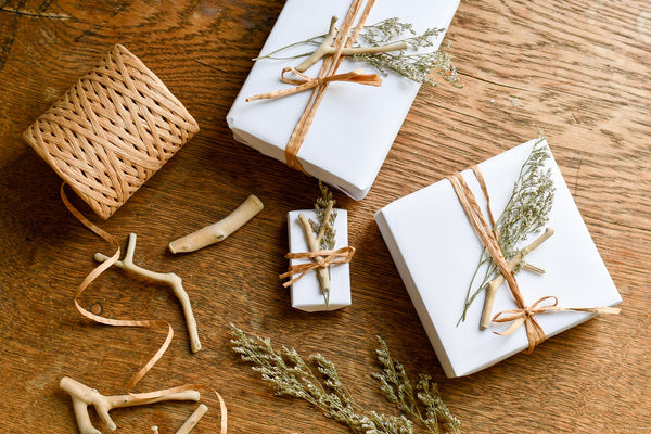 sailormade coastal christmas wrapping paper with drift wood, dried flowers and twine