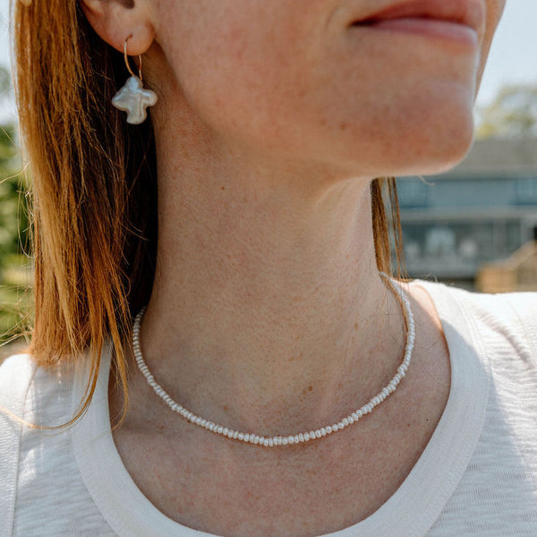 Sailormade women's minimalist fresh water white pearl necklace with 14k gold fill clasp. Handmade in Newburyport, MA.