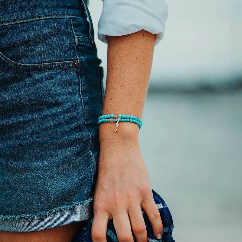 UV awareness beaded beach bracelet for sun safety in cyan turquoise