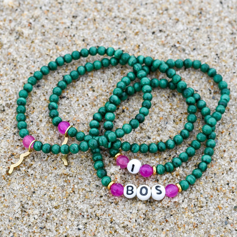 Stackable Rayminder UV Awareness bracelets for sun safety and uv protection in malachite
