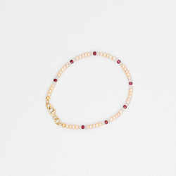 Sailormade women's pink pearl bracelet with rose quartz and garnet beads. Made in Boston, MA.