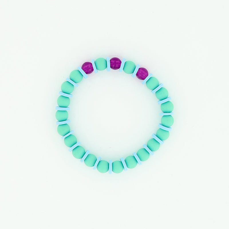Sailormade kid's rayminder uv awareness bracelet for sun safety education with green and blue beads. Handmade locally in Boston.