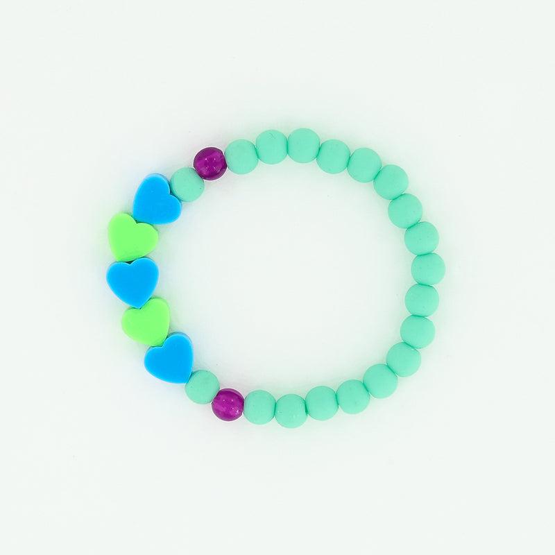 Sailormade kid's rayminder uv awareness bracelet for sun safety education with heart beads in green and blue. Handmade locally in Boston.