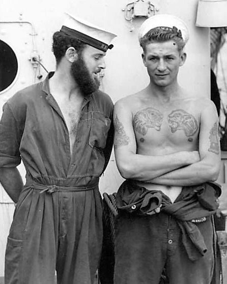 sailors on vintage ship