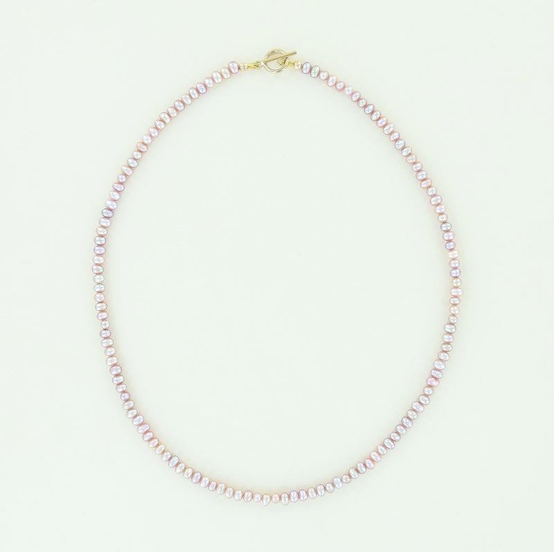 Sailormade women's minimalist fresh water pearl necklace in pink. handmade in newburyport, massachusetts.