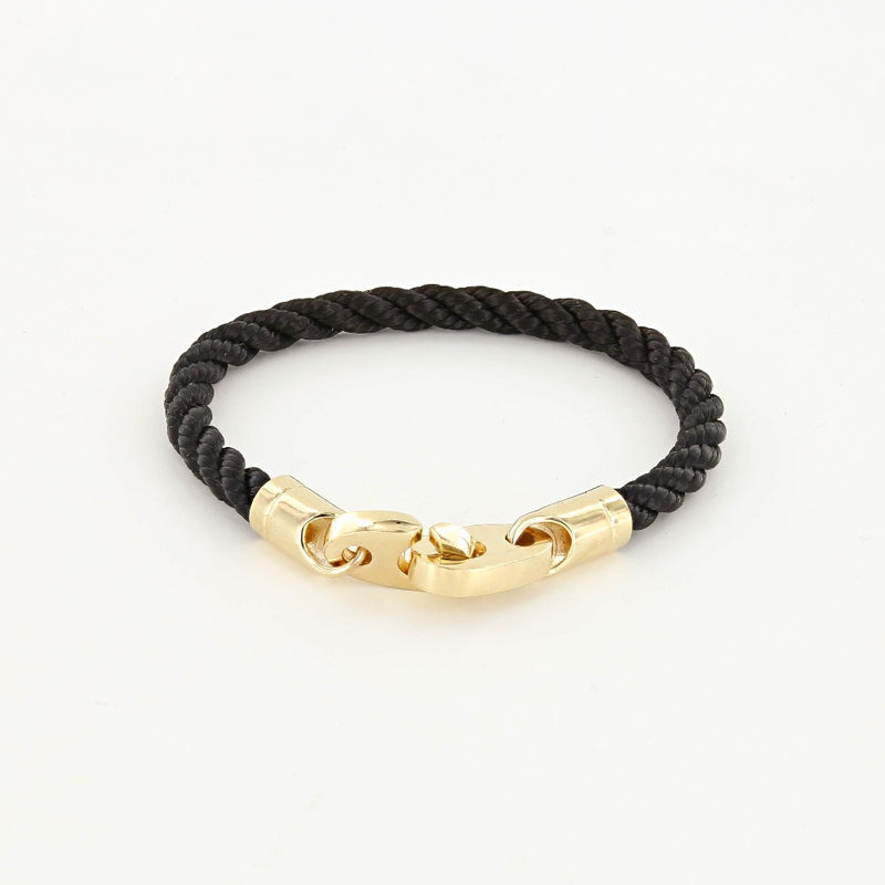 The endeavor single wrap marine black rope bracelet with gold brummels from sailormade women’s nautical jewelry collection. Handmade with superb quality in Boston, MA.