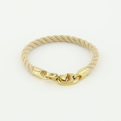 The endeavor single wrap wheat marine rope bracelet with gold brummels from sailormade women’s nautical jewelry collection. Handmade with superb quality in Boston, MA.
