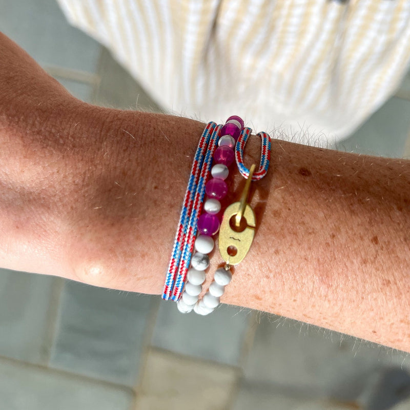 summer rayminder uv awareness sun sensitive bracelet with red white and blue rope and howlite beads