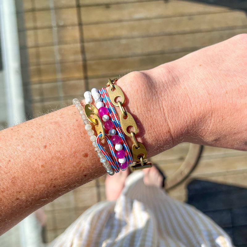summer rayminder uv awareness sun sensitive bracelet with red white and blue rope and howlite beads