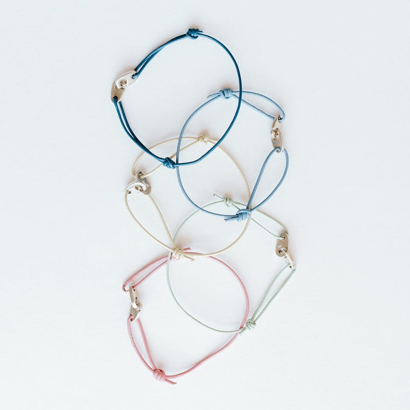 Sailormade women’s nautical leather wrap sterling silver mini brummel bracelet with adjustable slipknots.