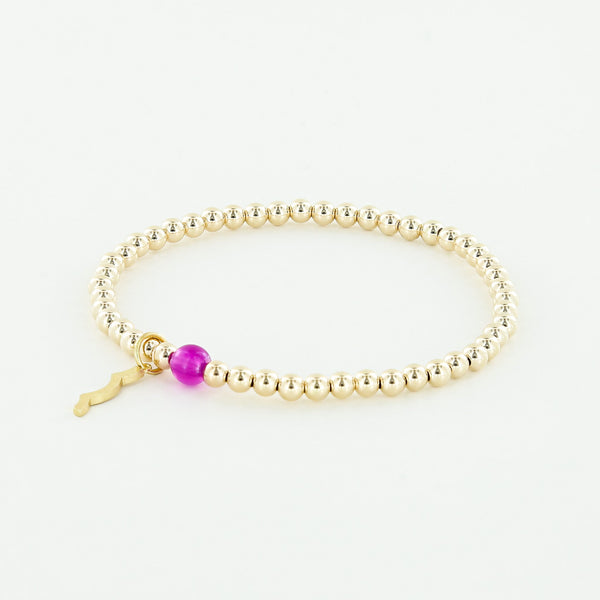 Sailormade rayminder uv awareness bracelet in 4mm 14k yellow gold fill beads. Wear for increased sun safety and protection. Made by Boston’s favorite bracelet company.