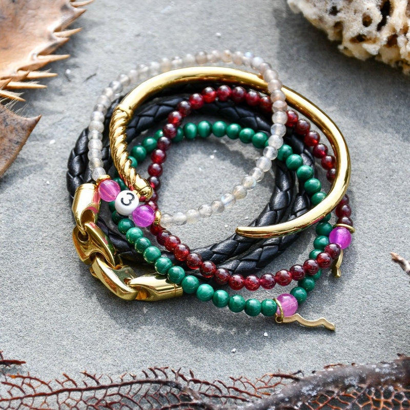 Rayminder UV Awareness bracelets for sun safety and uv protection in garnet, malachite, labradorite, gold with women's nautical stacking bracelets