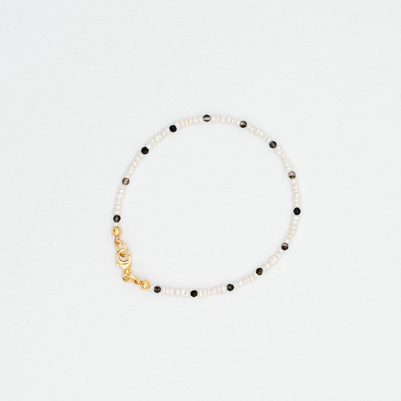 Sailormade women's Bracelet. Mini freshwater pearls are paired with smokey quartz.