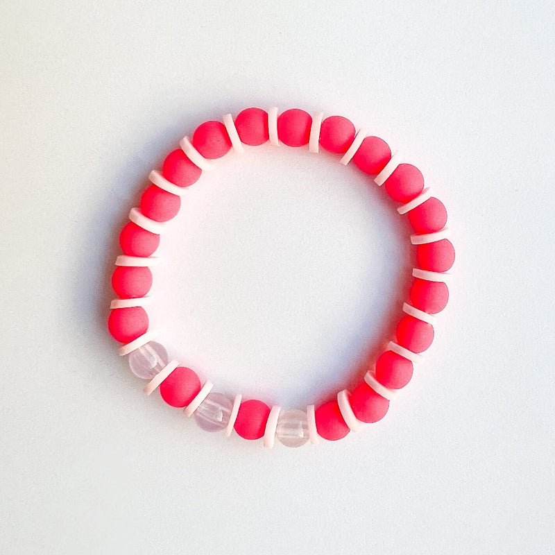 Sailormade kid's rayminder uv awareness bracelet for sun safety education with pink beads. Handmade locally in Boston.