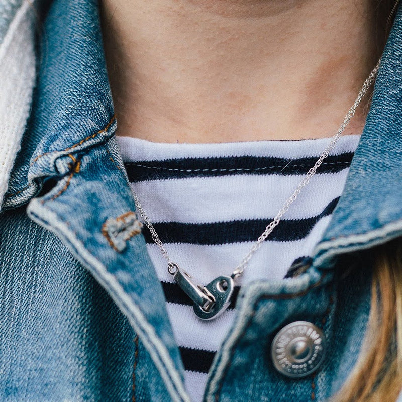 Preppy woman wearing sailor stripes and Sailormade nautical double brummel necklace in sterling silver. Rockport, MA