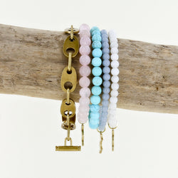 uv awareness Rayminder bracelets for sun safety in rose quartz, turquoise, angelite, moonstone and brummel link bracelet in matte brass
