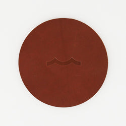 Sailormade nautical leather coasters with wave motif in chestnut brown. Made in Massachusetts with USA leather.