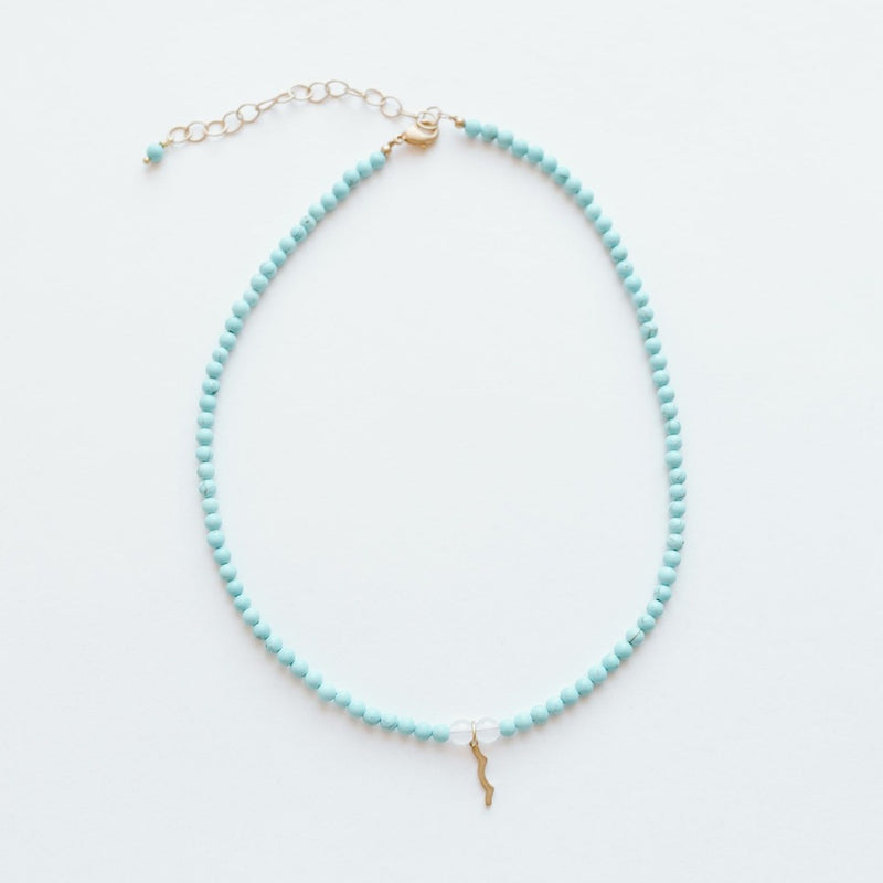 Sailormade rayminder uv sensitive necklace with cyan turquoise beads. 