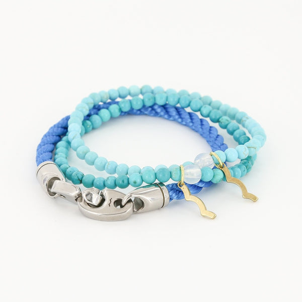 women's ocean blues bracelet stack with rayminder uv awareness bracelets and brummel bracelet