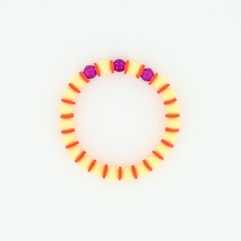 Sailormade kid's rayminder uv awareness bracelet for sun safety education with yellow and orange beads. Handmade locally in Boston.