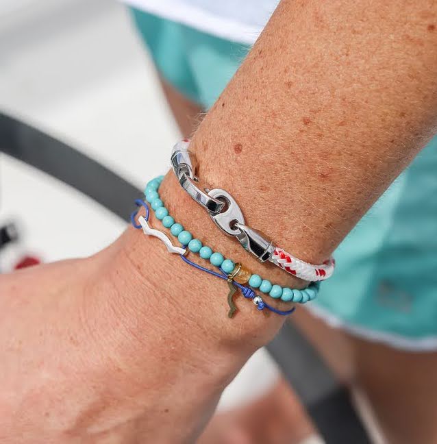  Sailormade rayminder uv awareness bracelet in cyan turquoise. Wear for increased sun safety and protection. Made by Boston’s favorite bracelet company.