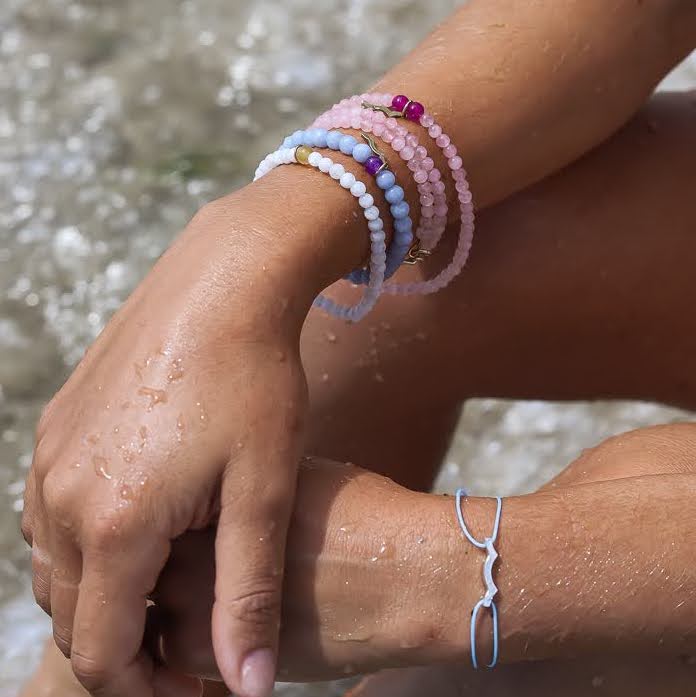 Sailormade rayminder uv awareness bracelet in rose quartz. Wear for increased sun safety and protection. Made by Boston’s favorite bracelet company.